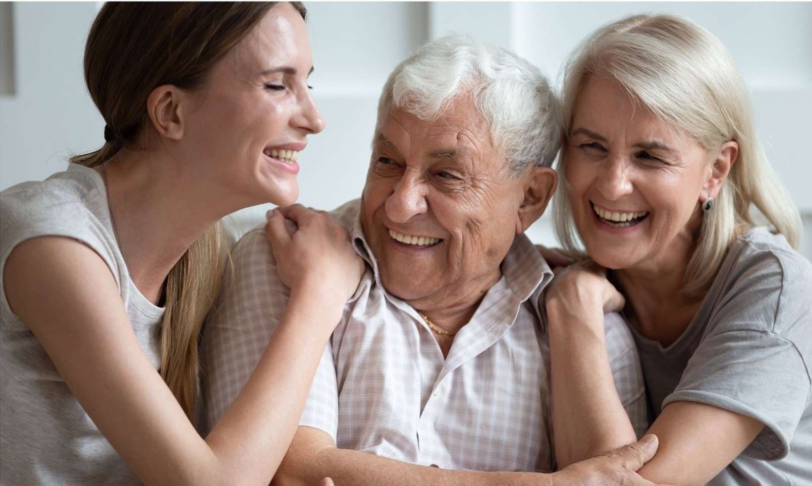 Old Man Laughing with his Adults Kids