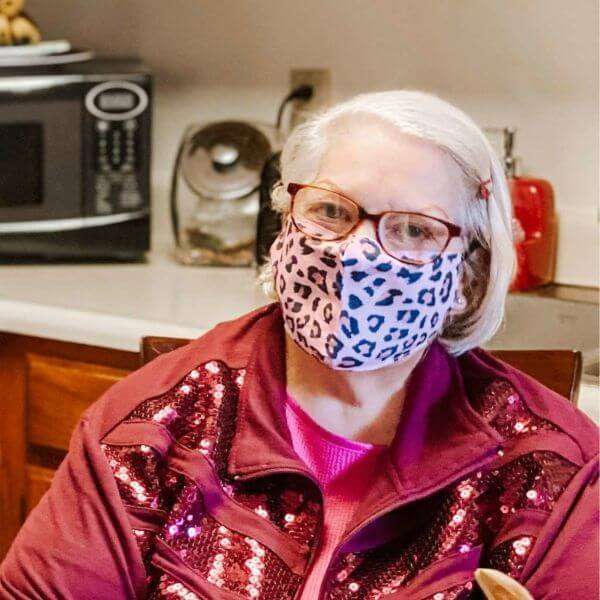 Older woman wearing face mask