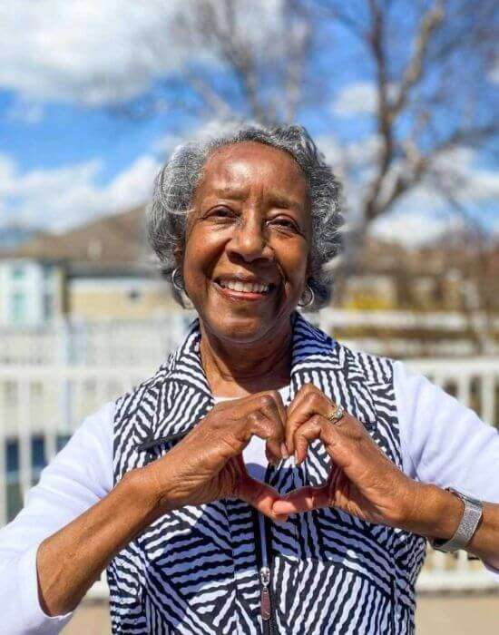 Woman making a heart with hands
