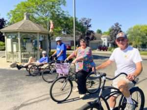four people on bicycles